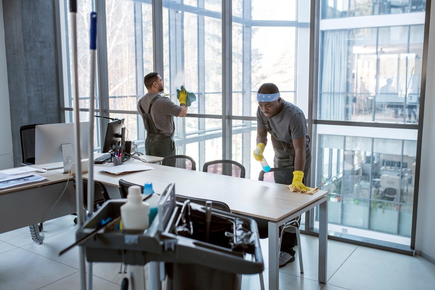 full-shot-men-cleaning-office 1