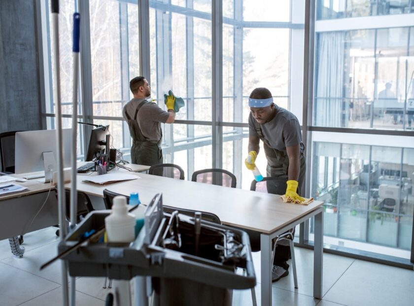full-shot-men-cleaning-office 1