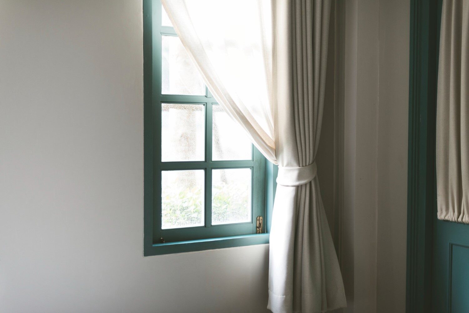 simple-window-with-white-curtain 1