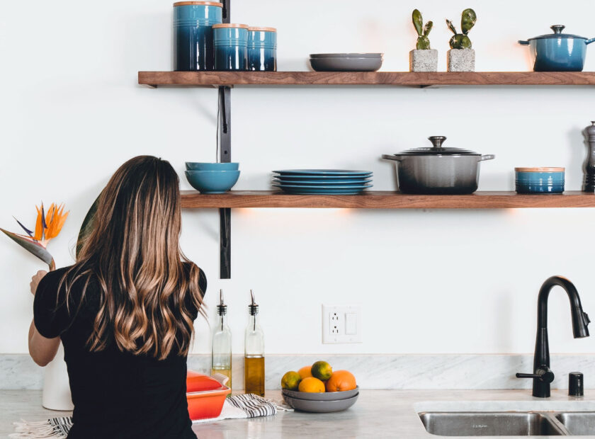 woman cleaning the kitchen